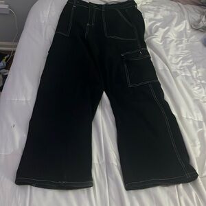 black jeans with a lot of pockets. size M.